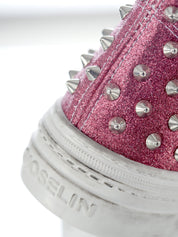 Jouer aux paillettes roses